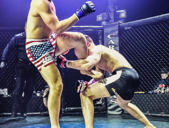 ‘Striving to do the hard thing,’ Waters competes in MMA fight